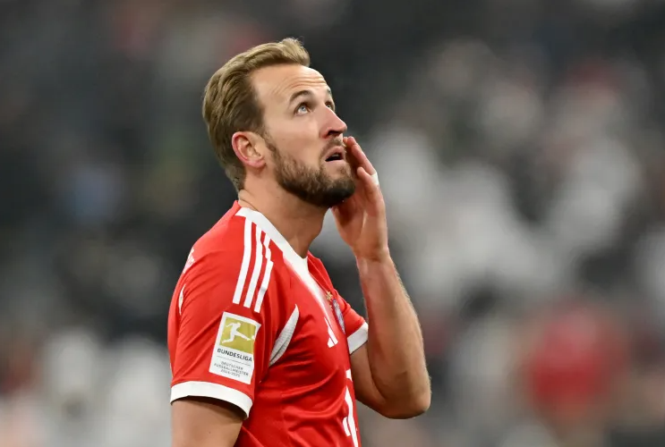 Kane Rues Missed Chances as Bayern's Invincible Hopes Crumble in Augsburg Shock