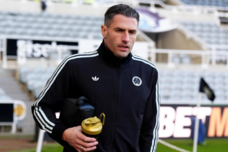 SCHAR'S NEWCASTLE FUTURE IN THE BALANCE AS HOWE ADMITS 'NO DECISION MADE'