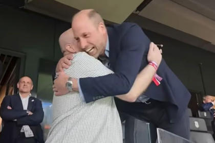 'You lead the way, mate!' Prince William hugs fan and makes cheeky fountains promise after Villa glory